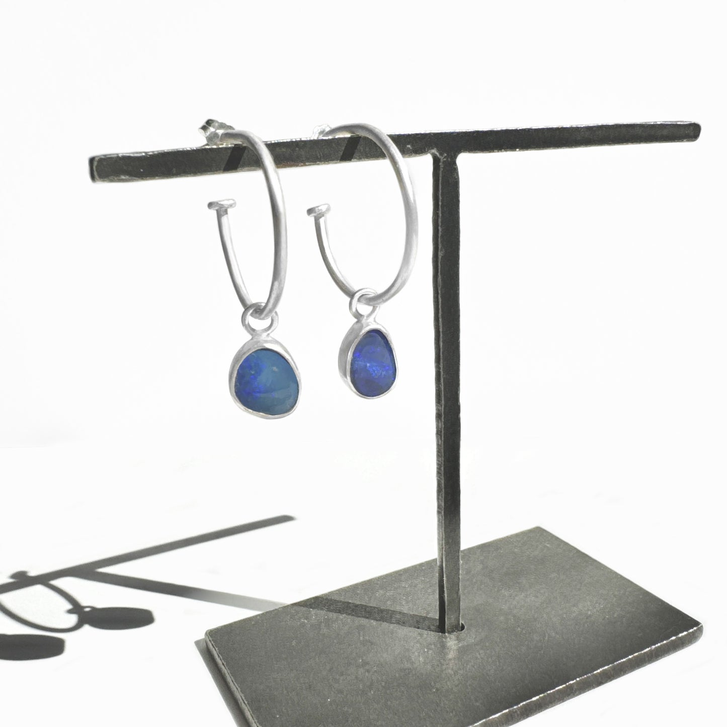 Versatile hoops with removable blue opals