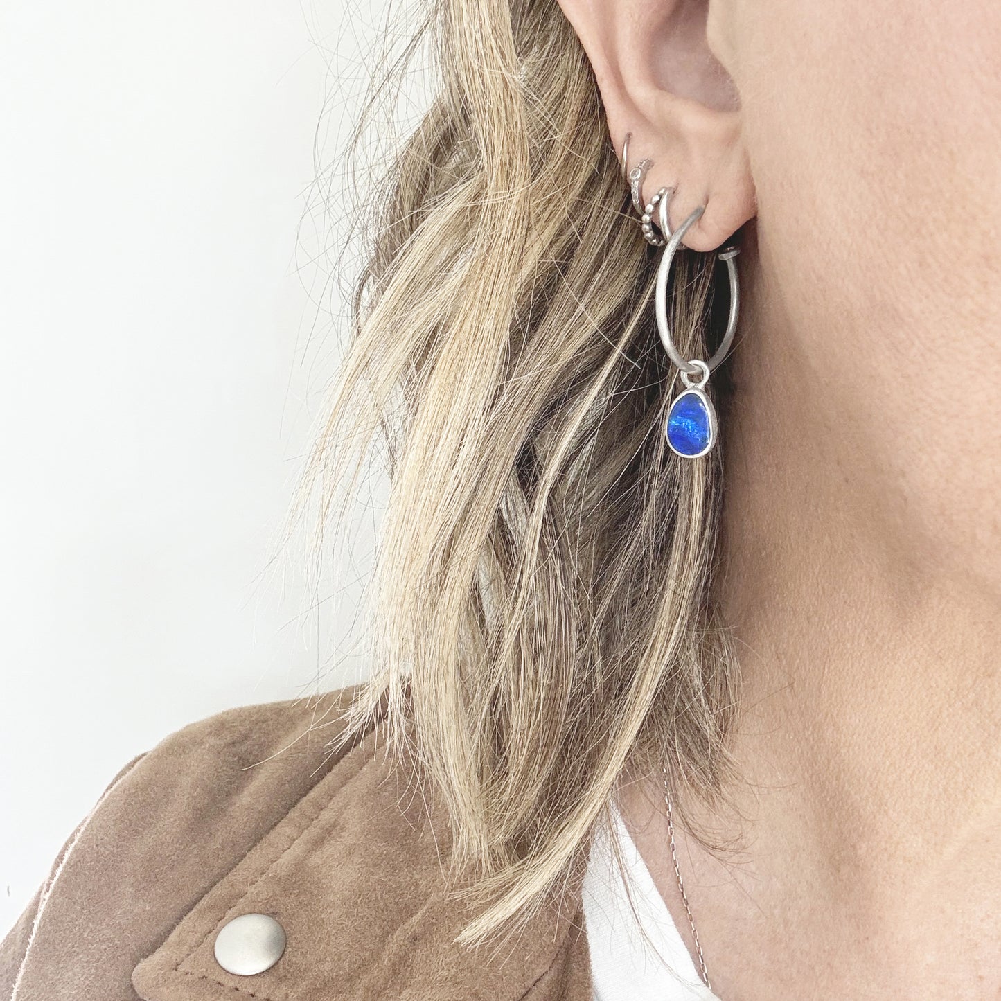 Versatile hoops with removable blue opals